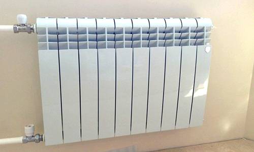 Расчет количества секций радиаторов отопления с обычным калькулятором с фото
